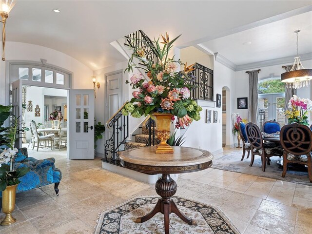 5808 Mistletoe Ct, Oklahoma City, OK 73142 - entrance foyer featuring french doors, an inviting chandelier, and vaulted ceiling