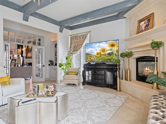 5808 Mistletoe Ct, Oklahoma City, OK 73142 - living room featuring beam ceiling, a large fireplace, and french doors