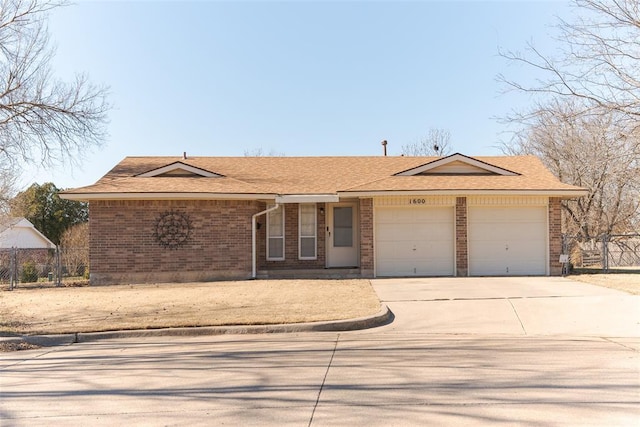 ranch-style home with a garage