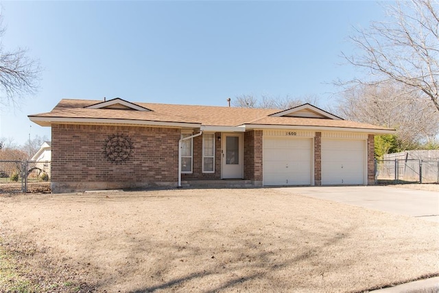 single story home featuring a garage