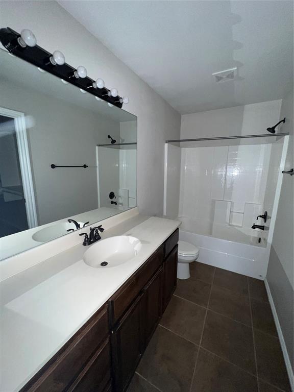 full bathroom with vanity, toilet, and shower / bath combination