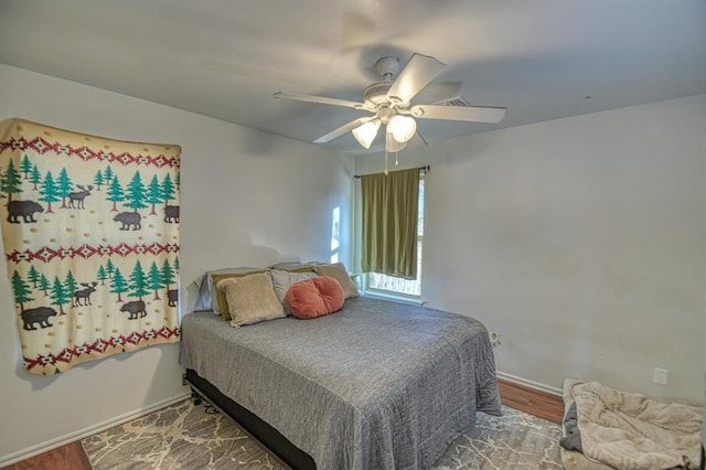 bedroom featuring ceiling fan and hardwood / wood-style floors