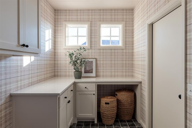 bathroom with tile patterned flooring