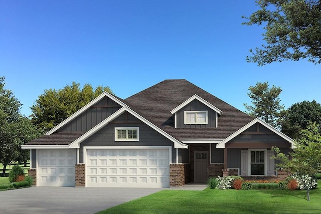 craftsman house featuring brick siding, driveway, an attached garage, and a front yard