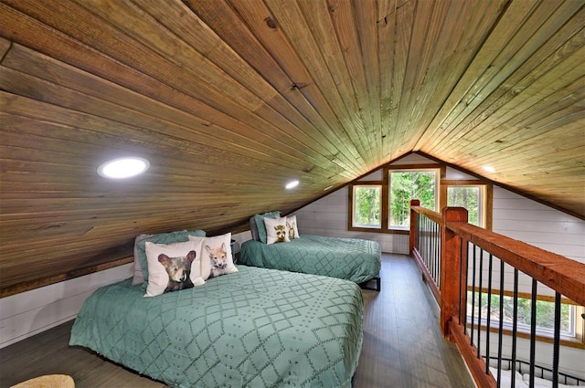 bedroom with lofted ceiling, wood walls, wood ceiling, and dark hardwood / wood-style floors