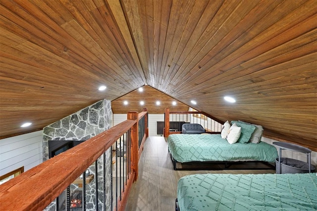 unfurnished bedroom with wooden walls, wooden ceiling, and lofted ceiling