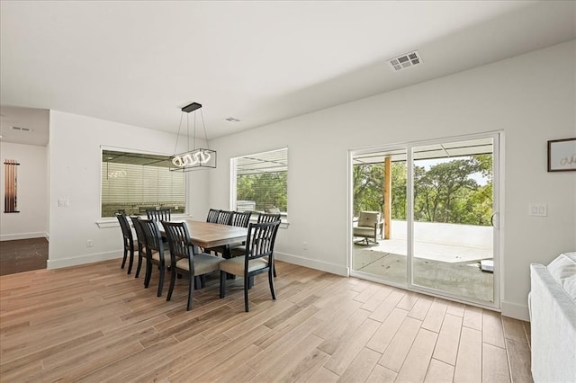 dining room featuring light wood-type flooring