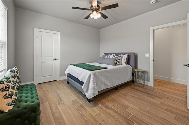 bedroom featuring ceiling fan and light wood-type flooring