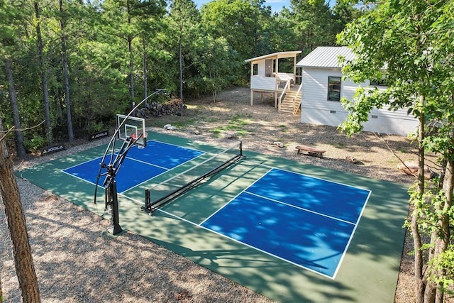 view of basketball court featuring tennis court