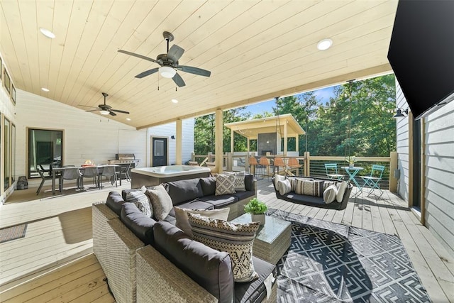 view of patio / terrace with outdoor lounge area, ceiling fan, and a wooden deck