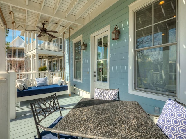 exterior space with covered porch and ceiling fan