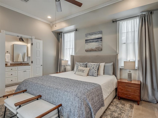 bedroom featuring light carpet, ensuite bath, ceiling fan, crown molding, and recessed lighting