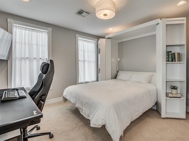 bedroom featuring light carpet, baseboards, visible vents, and recessed lighting