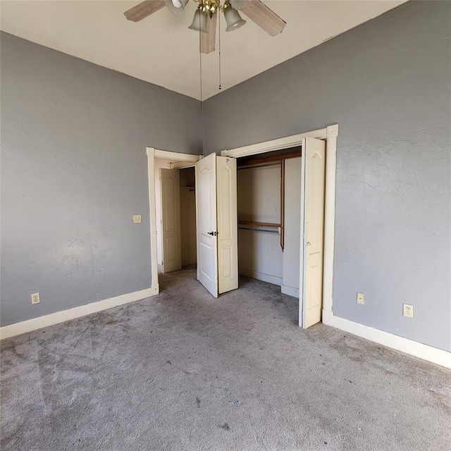 unfurnished bedroom featuring a closet, light colored carpet, and ceiling fan