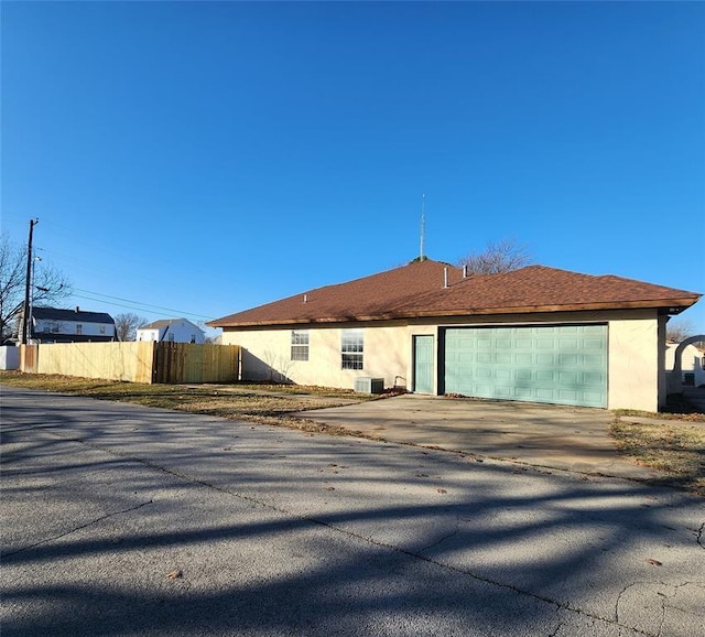 exterior space featuring a garage