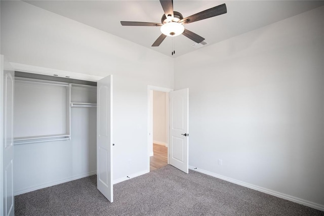 9237 NW 86th St, Yukon, OK 73099 - unfurnished bedroom with carpet flooring, a closet, and a ceiling fan