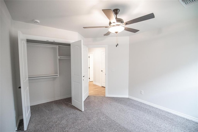 9237 NW 86th St, Yukon, OK 73099 - unfurnished bedroom featuring carpet flooring, a closet, and a ceiling fan