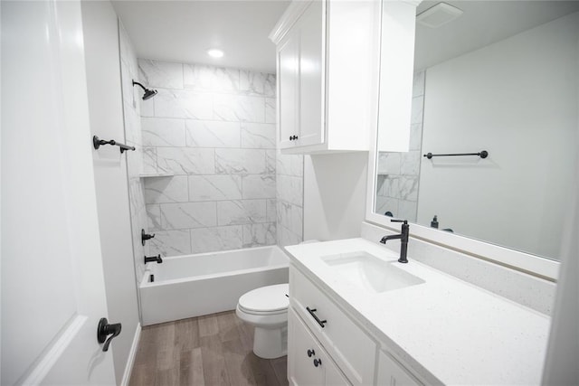 9237 NW 86th St, Yukon, OK 73099 - bathroom with vanity, wood finished floors, bathtub / shower combination, and recessed lighting