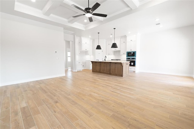 11813 Ethan Mark Dr, Yukon, OK 73099 - unfurnished living room featuring coffered ceiling, recessed lighting, beam ceiling, ceiling fan, and a sink