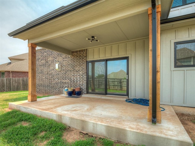 view of patio / terrace featuring ceiling fan