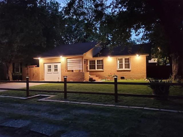 1021 W Apache St, Norman, OK 73069 - ranch-style house featuring brick siding