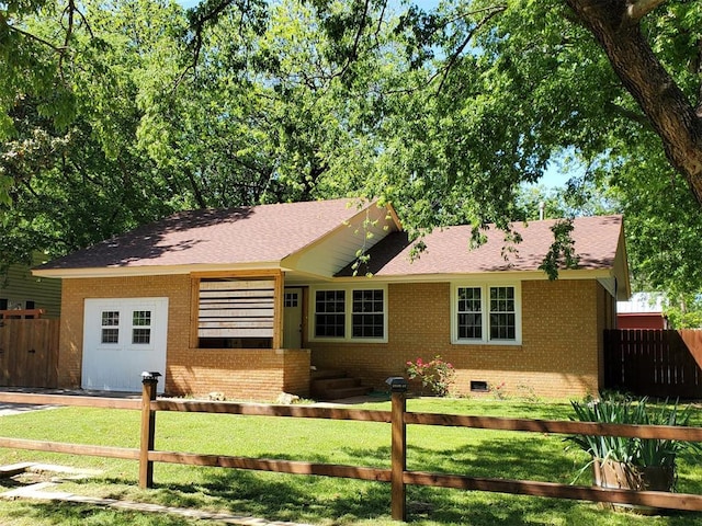 1021 W Apache St, Norman, OK 73069 - ranch-style house featuring brick siding, crawl space, and a shingled roof