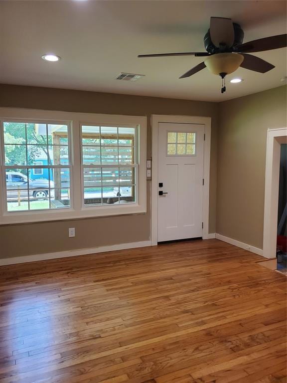 1021 W Apache St, Norman, OK 73069 - entrance foyer with light wood-style flooring, baseboards, recessed lighting, and a ceiling fan