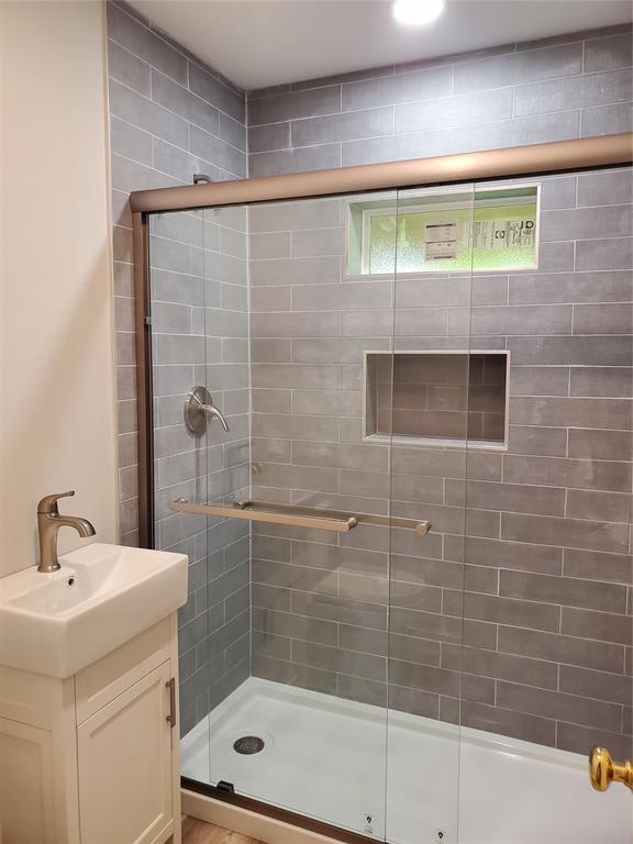 1021 W Apache St, Norman, OK 73069 - full bath with a shower stall and vanity