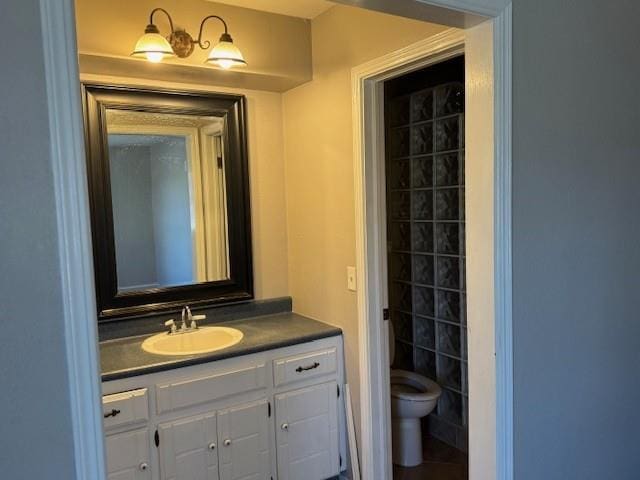 bathroom with vanity and toilet