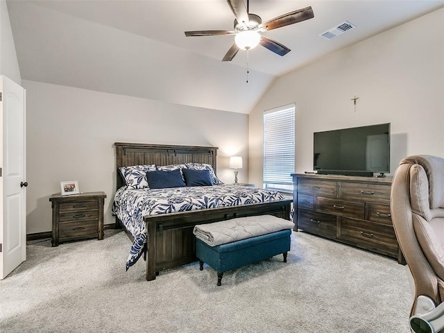 bedroom with ceiling fan, light carpet, and lofted ceiling