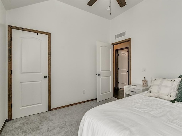 bedroom featuring carpet flooring, ceiling fan, and lofted ceiling