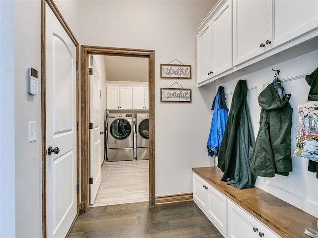 mudroom with independent washer and dryer