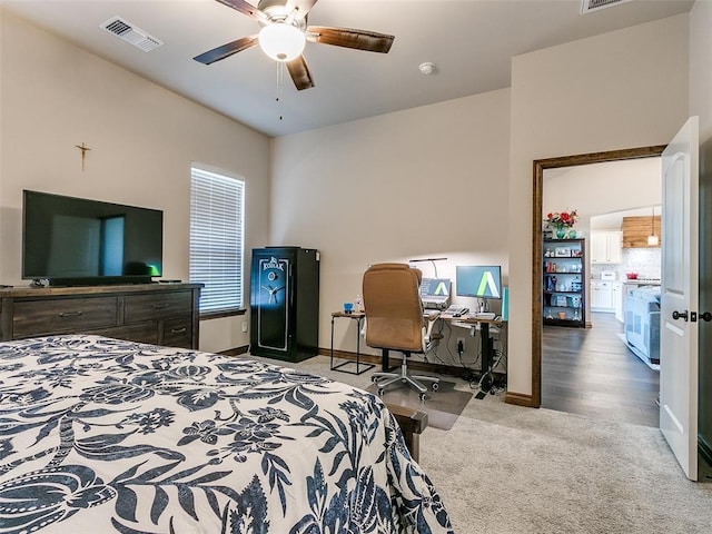 bedroom with carpet, multiple windows, and ceiling fan