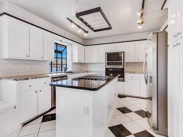 2207 Lake Front Cir, Norman, OK 73069 - kitchen with black appliances, rail lighting, a center island, and light tile patterned floors