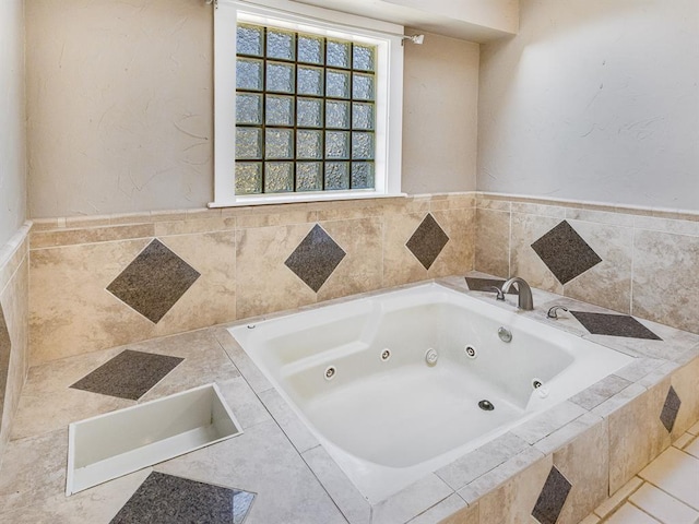 bathroom featuring tiled bath