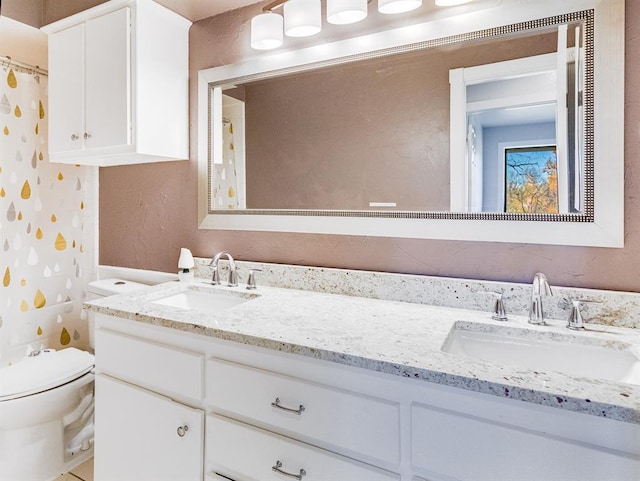 2207 Lake Front Cir, Norman, OK 73069 - bathroom featuring double vanity and a shower with shower curtain