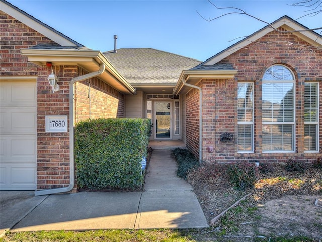 entrance to property featuring a garage