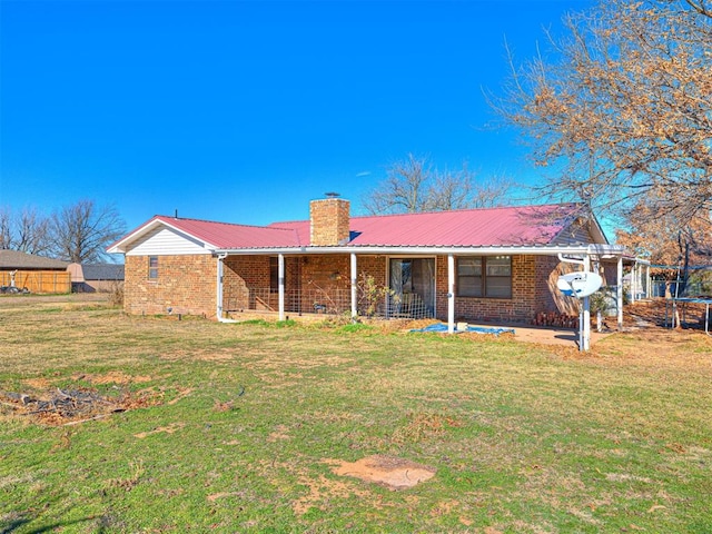 ranch-style home with a front yard