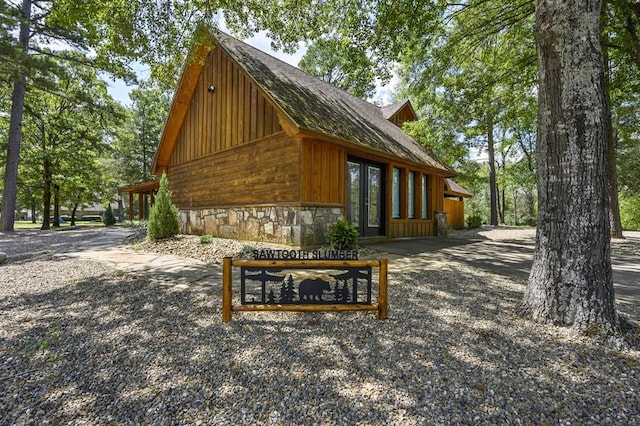 view of property exterior with french doors