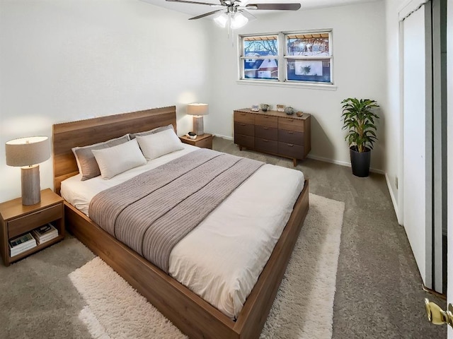 carpeted bedroom with ceiling fan