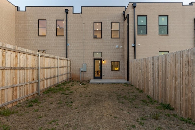 back of property featuring a patio area