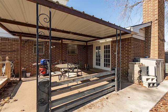 view of patio featuring french doors