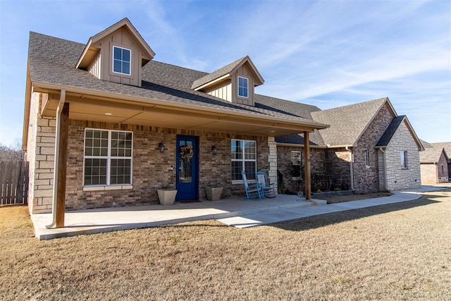 rear view of house with a patio