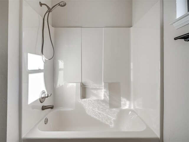 bathroom featuring shower / bath combination