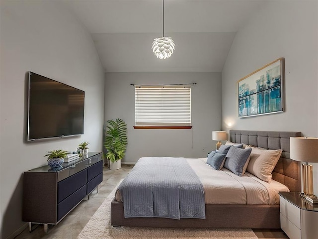 bedroom featuring vaulted ceiling