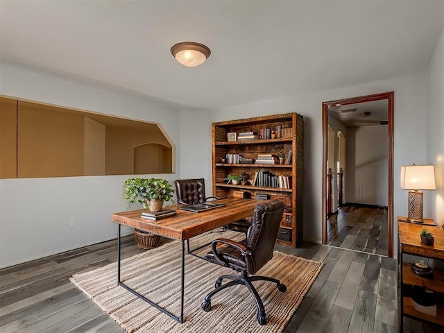 office space featuring dark hardwood / wood-style flooring