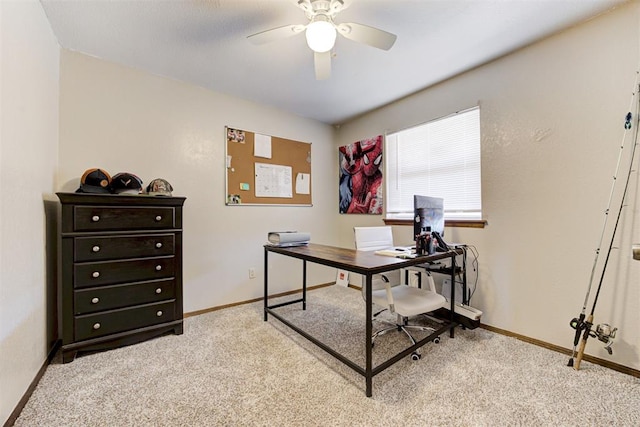 carpeted home office with ceiling fan