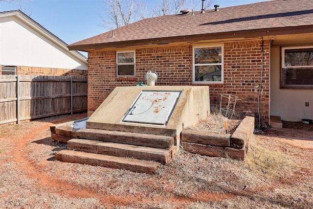 view of entry to storm shelter