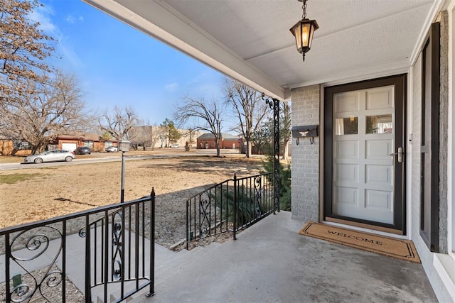 doorway to property featuring a porch