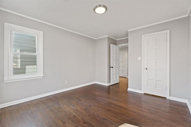 unfurnished bedroom featuring crown molding and dark wood-type flooring